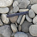 Kamenclub.ru: Галька речная плоская (серо-белая) фр. 70-120 мм. купить  в Люберцах галька галечник речной серый, белый окатанная плоская  природная галька 9000 руб/т   фото КАМЕНЬ КЛУБ